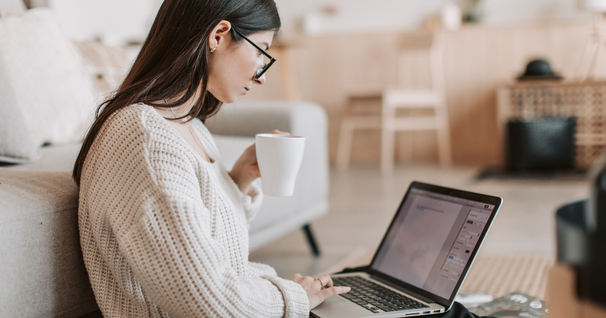 women drinking coffee on computer